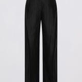 Black wide-leg trousers with a subtle vertical textured stripe pattern, shown flat against a light gray background.