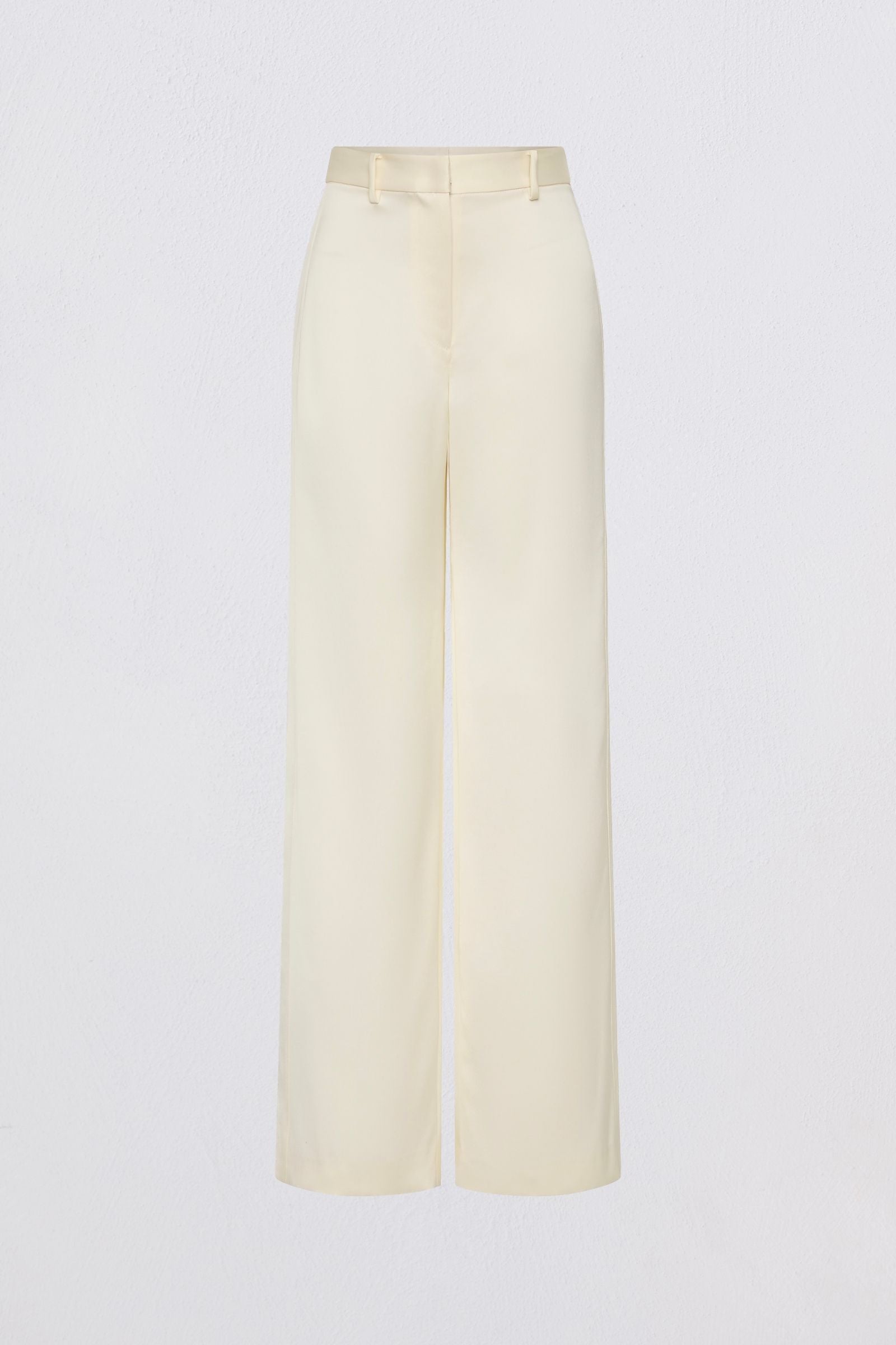 Beige pants on a light gray background