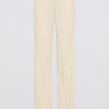 A pair of light cream or off-white wide-leg trousers with a subtle vertical textured pattern, shown flat against a plain white background.