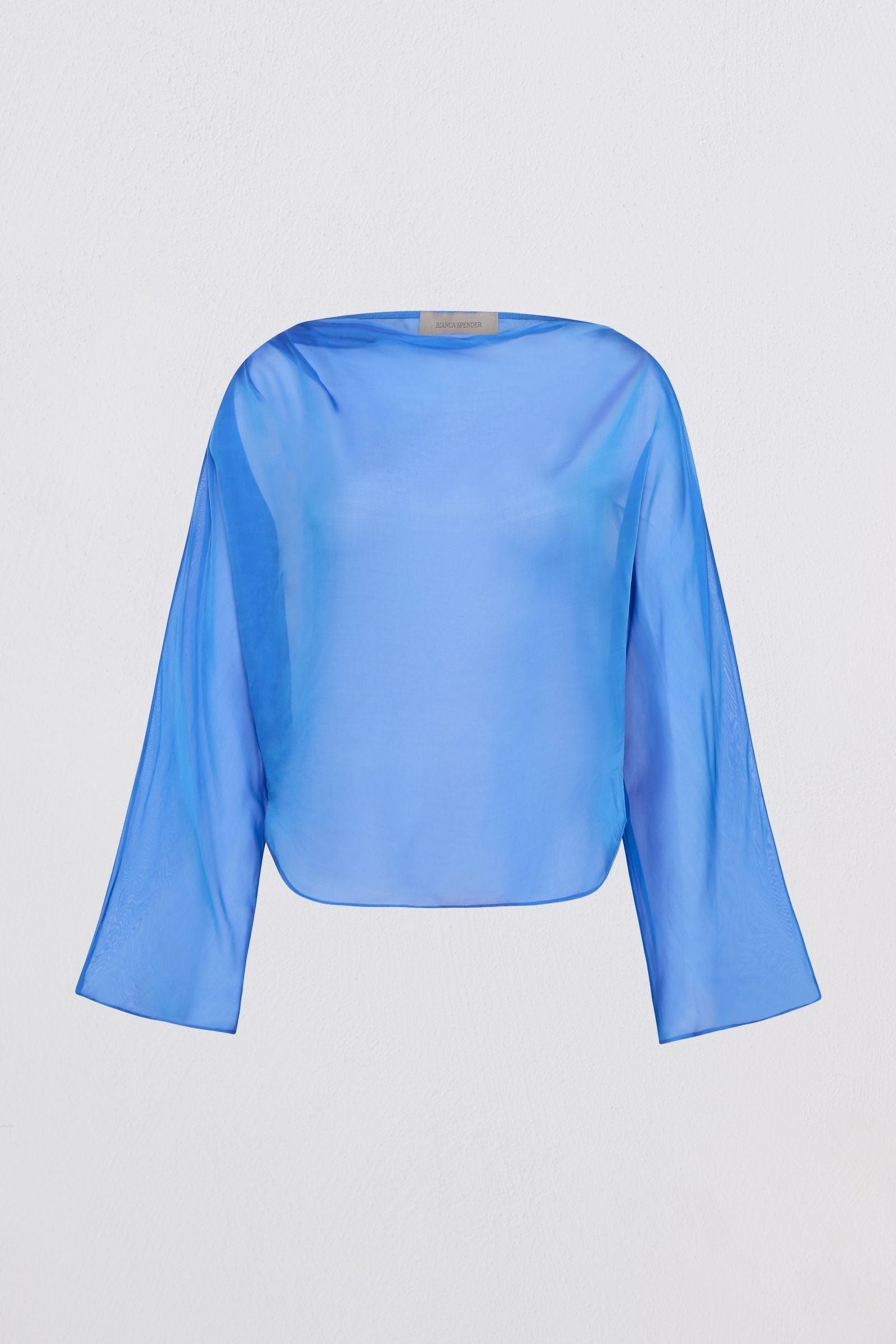A light blue long-sleeve blouse with a wide boat neckline, displayed against a plain light gray background.
