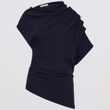Black draped top on a light gray background