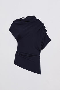 Black draped top on a light gray background