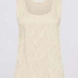 A sleeveless scoop-neck top in a light cream or off-white color, shown flat against a light gray background.