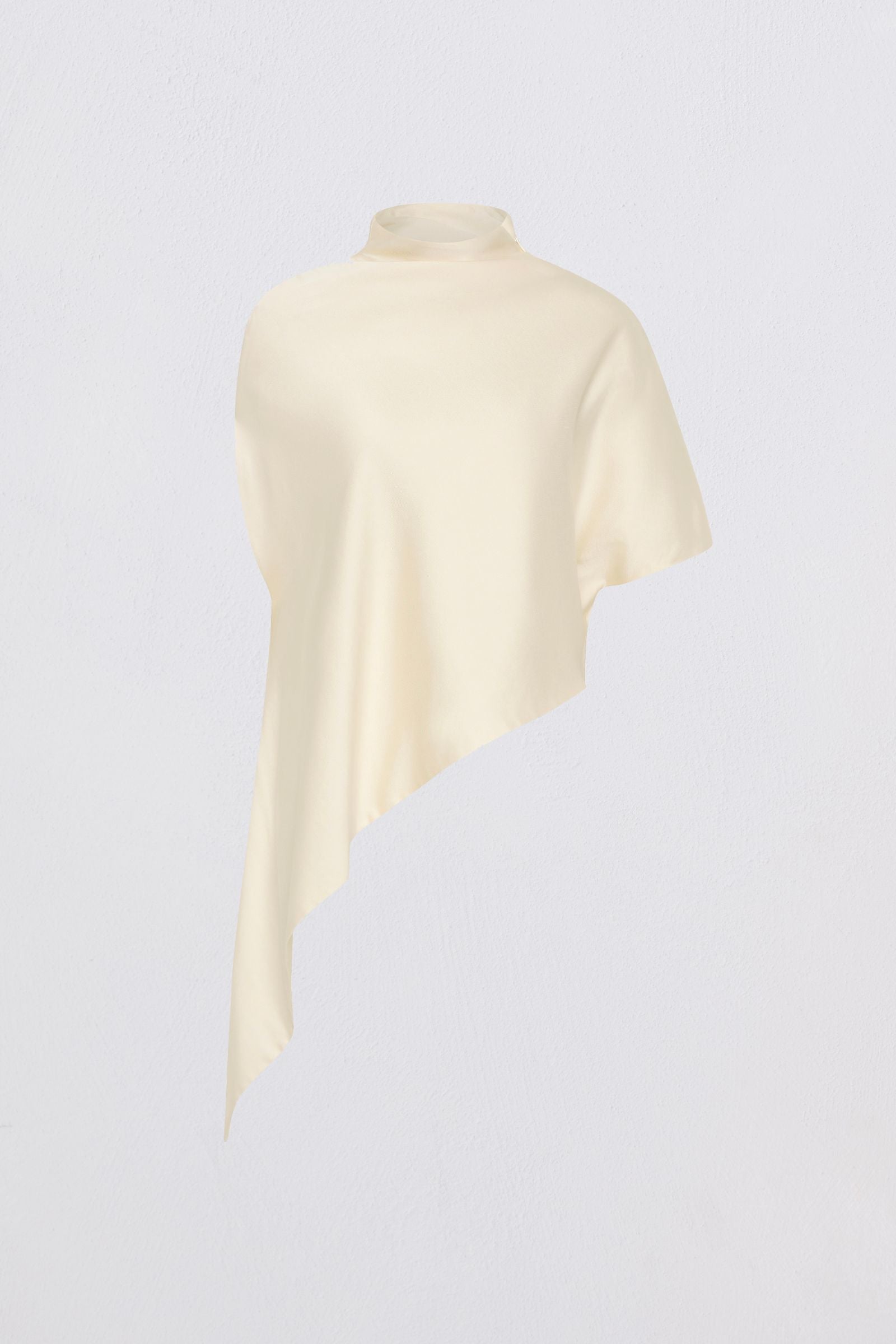Cream-colored top on a light gray background