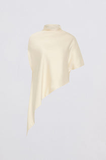 Cream-colored top on a light gray background