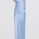 A light blue strapless gown with a draped, gathered bodice and a fitted, floor-length silhouette, shown against a plain light gray background.