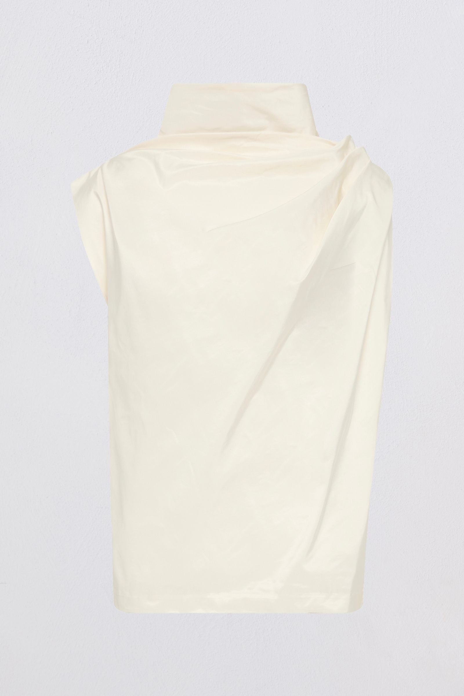 A cream-colored sleeveless top with a high mock neck collar, shown from the back against a light gray background.