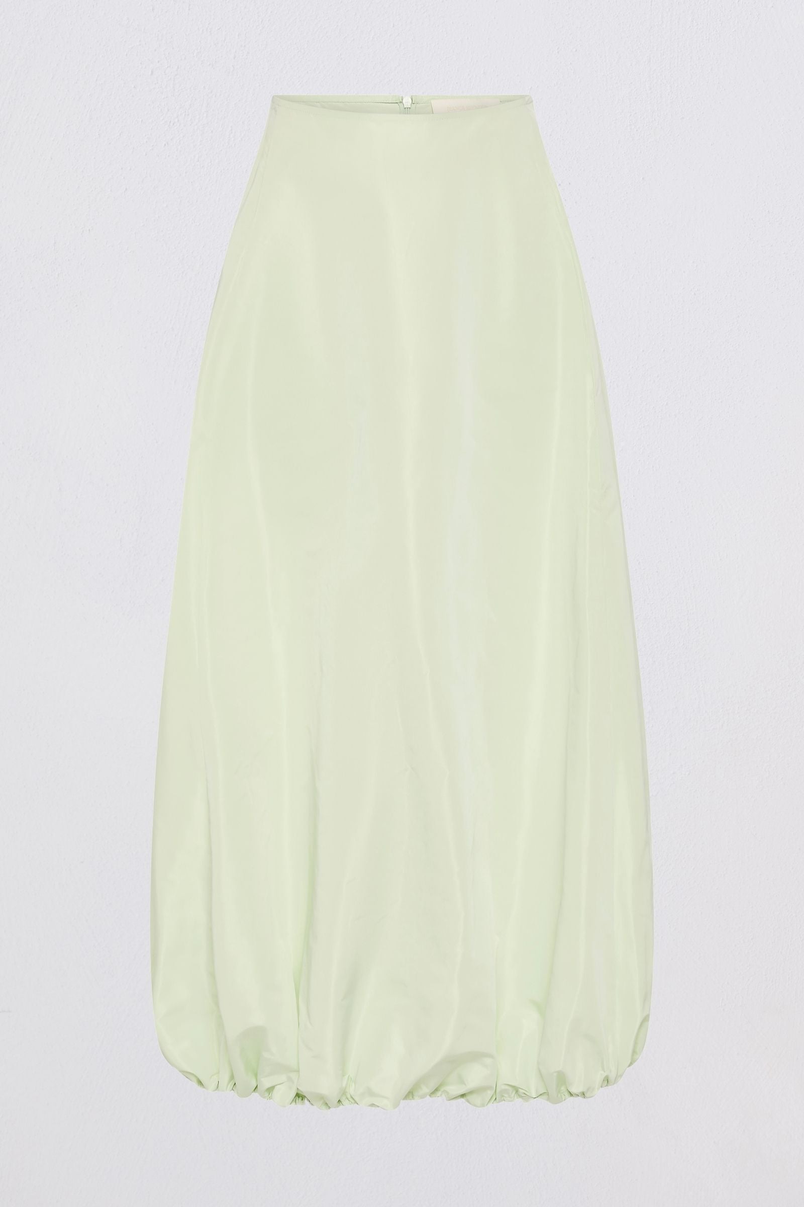 A light mint green midi skirt with a gathered, balloon-like silhouette and a high waistband, shown against a plain white background.