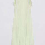 A pale mint green sleeveless maxi dress with a mock neck and gathered balloon hem, shown against a plain light gray background.