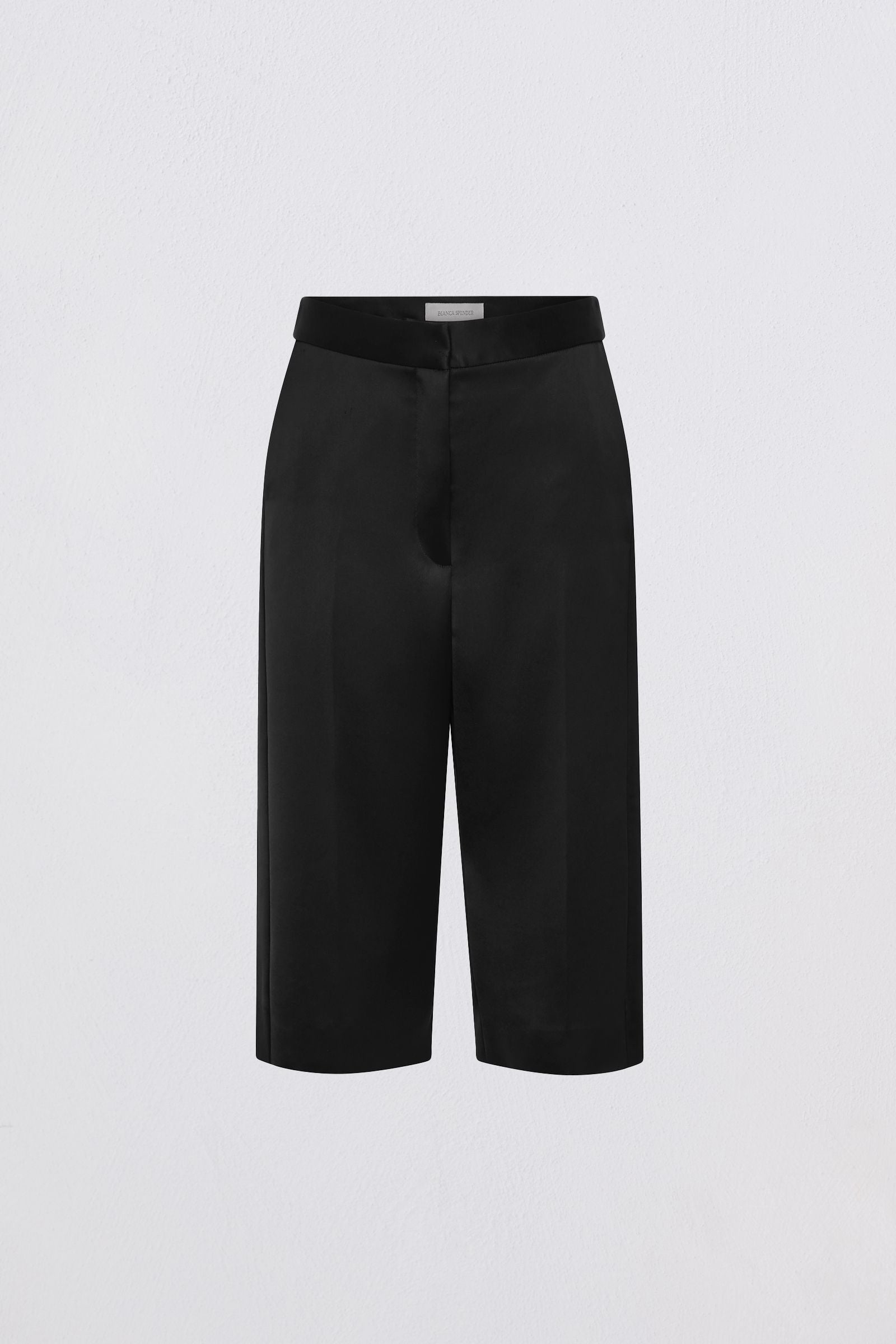 Black wide-leg cropped trousers with a structured waistband, photographed flat against a light gray background.