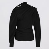 Black long-sleeve top with draped design on a light gray background