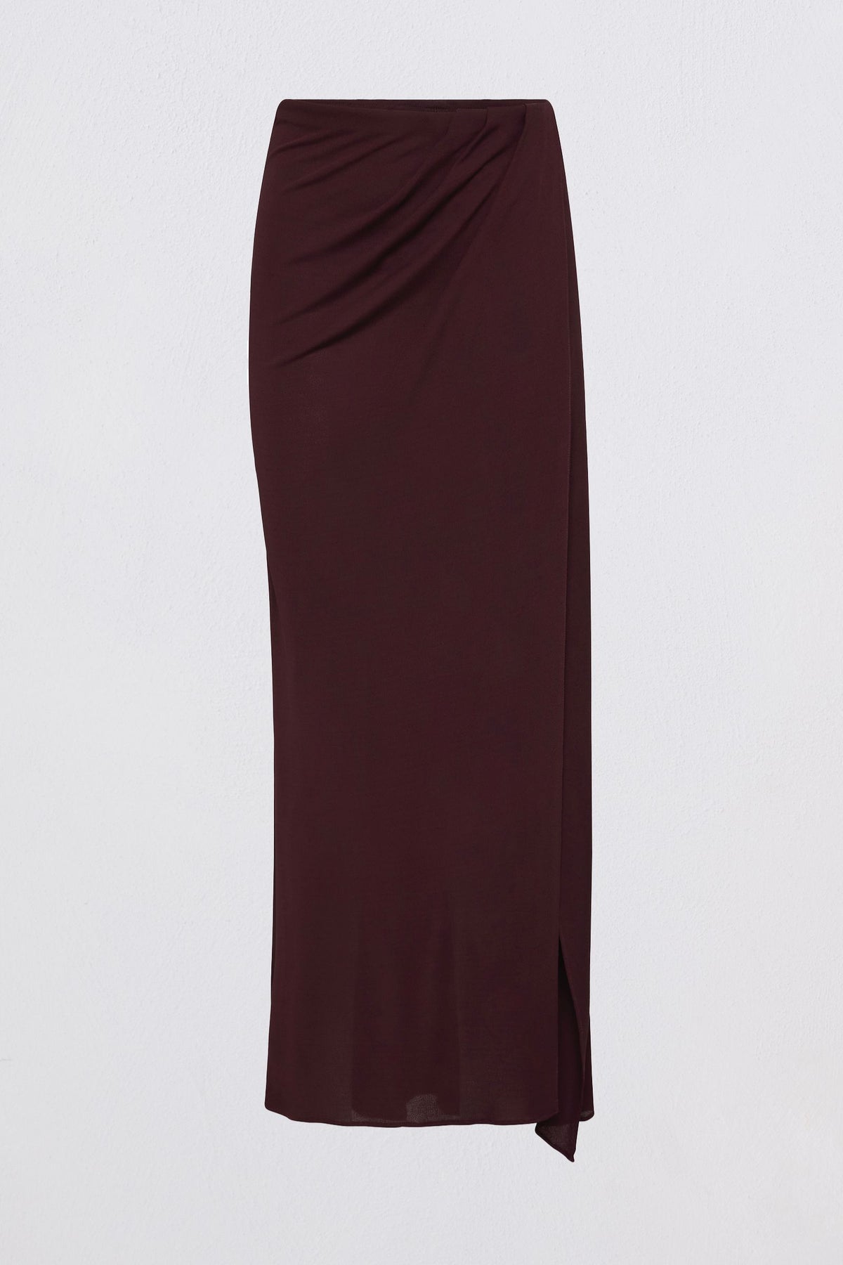 A dark burgundy wrap midi skirt with a draped waist and side slit, displayed on a clean white background.