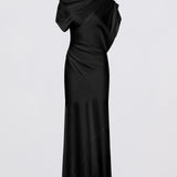 Black one-shoulder dress on a light gray background