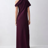 Woman wearing a one-shoulder purple gown on a white background