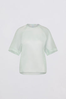 Light green t-shirt on a white background