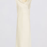 Cream-colored sleeveless dress on a light gray background