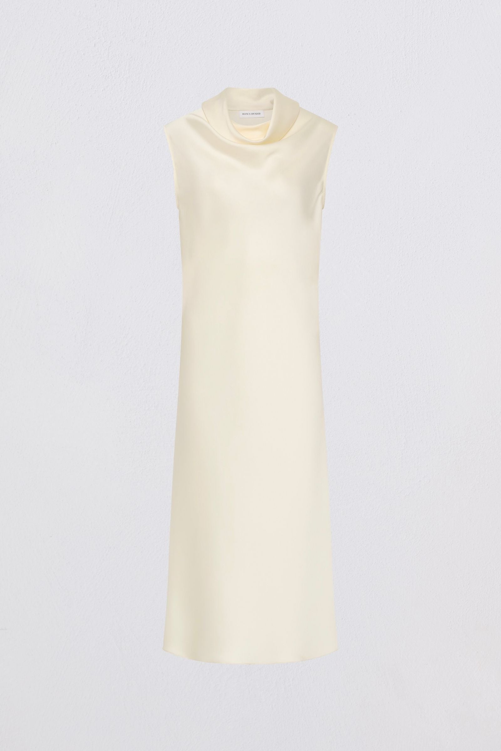 Cream-colored sleeveless dress on a light gray background