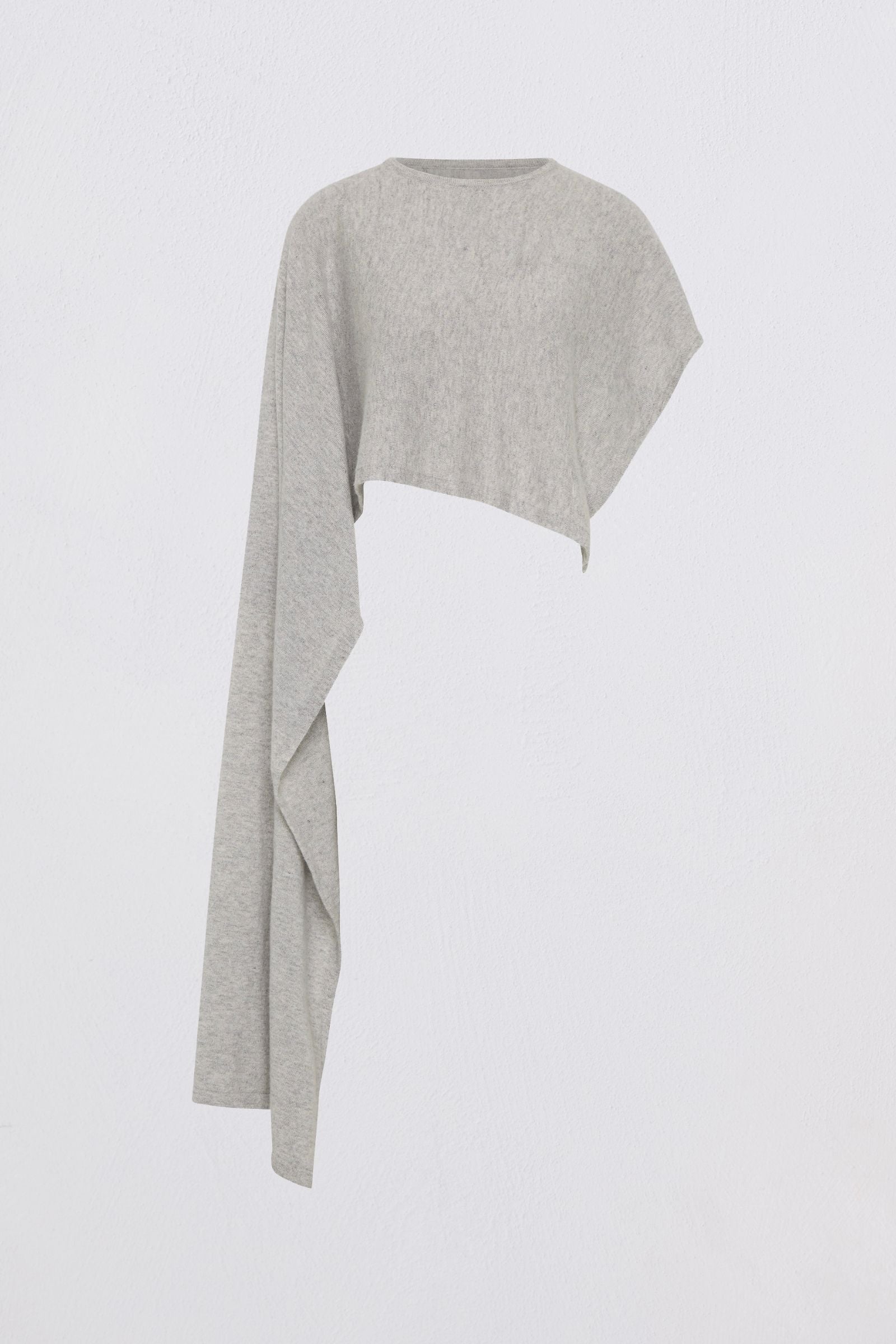 Gray knit top with draped design on a light gray background