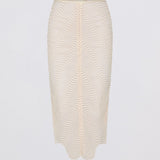 White textured skirt on a light gray background