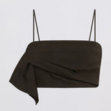 A dark brown draped fabric top with thin black spaghetti straps, displayed against a clean white background.