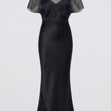 A black satin maxi dress with sheer short sleeves and a high mock neck, displayed on a ghost mannequin against a light gray background.